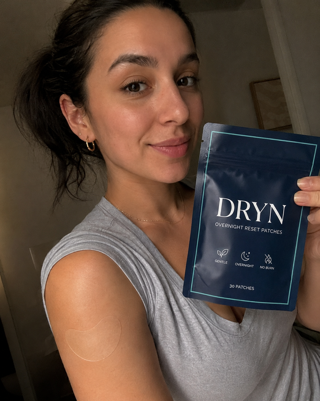 DRYN customer Susan R. holding a pouch